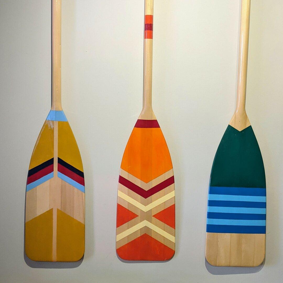 3 wooden canoe paddles