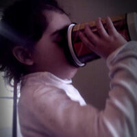 My daughter chugging from a disposable coffee cup